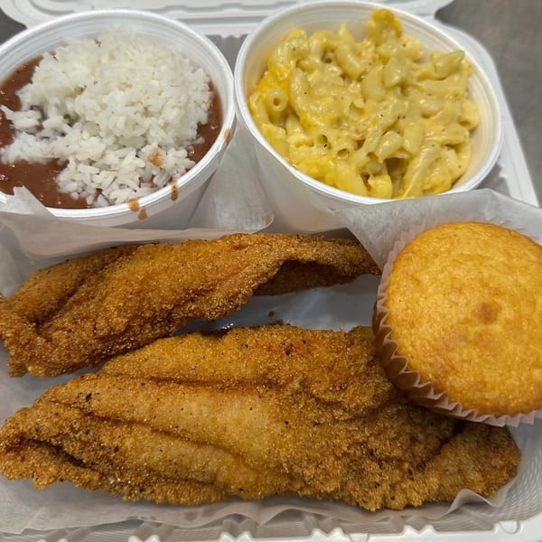 Marie's Soul Food take-out meal with fried fish, red beans and rice, macaroni and cheese, and cornbread.